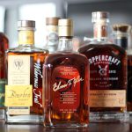 Whiskey bottles lined up