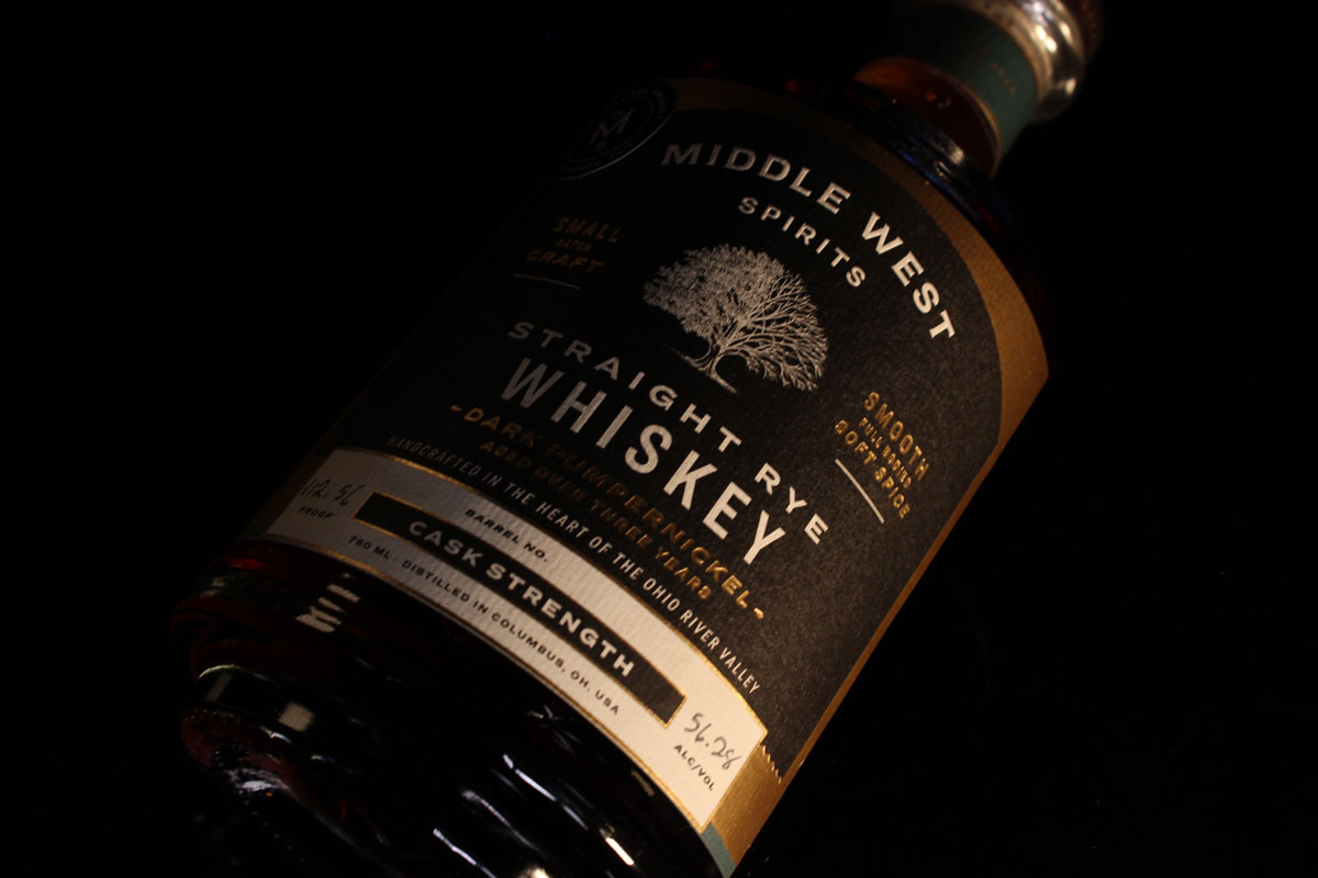 A closeup of the label for Middle West Cask Strength Rye Whiskey.